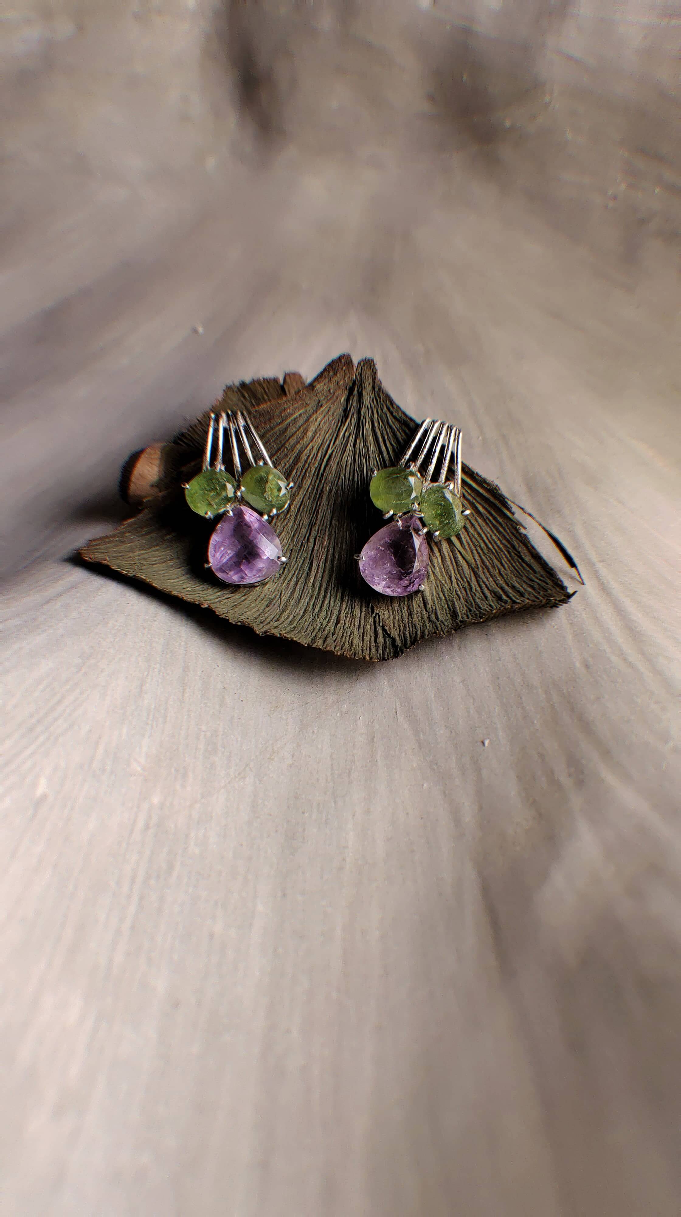 Zeya: A handcrafted Earrings featuring Opal Sapphire and hues of White Blue.