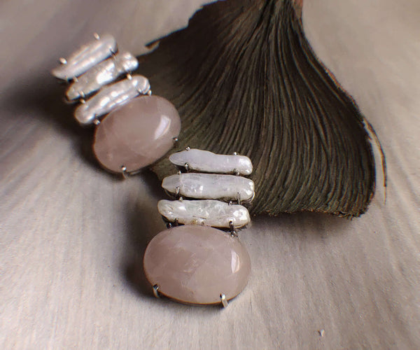 Charm: A handcrafted Earrings featuring Pearl Jade and hues of Yellow Grey.