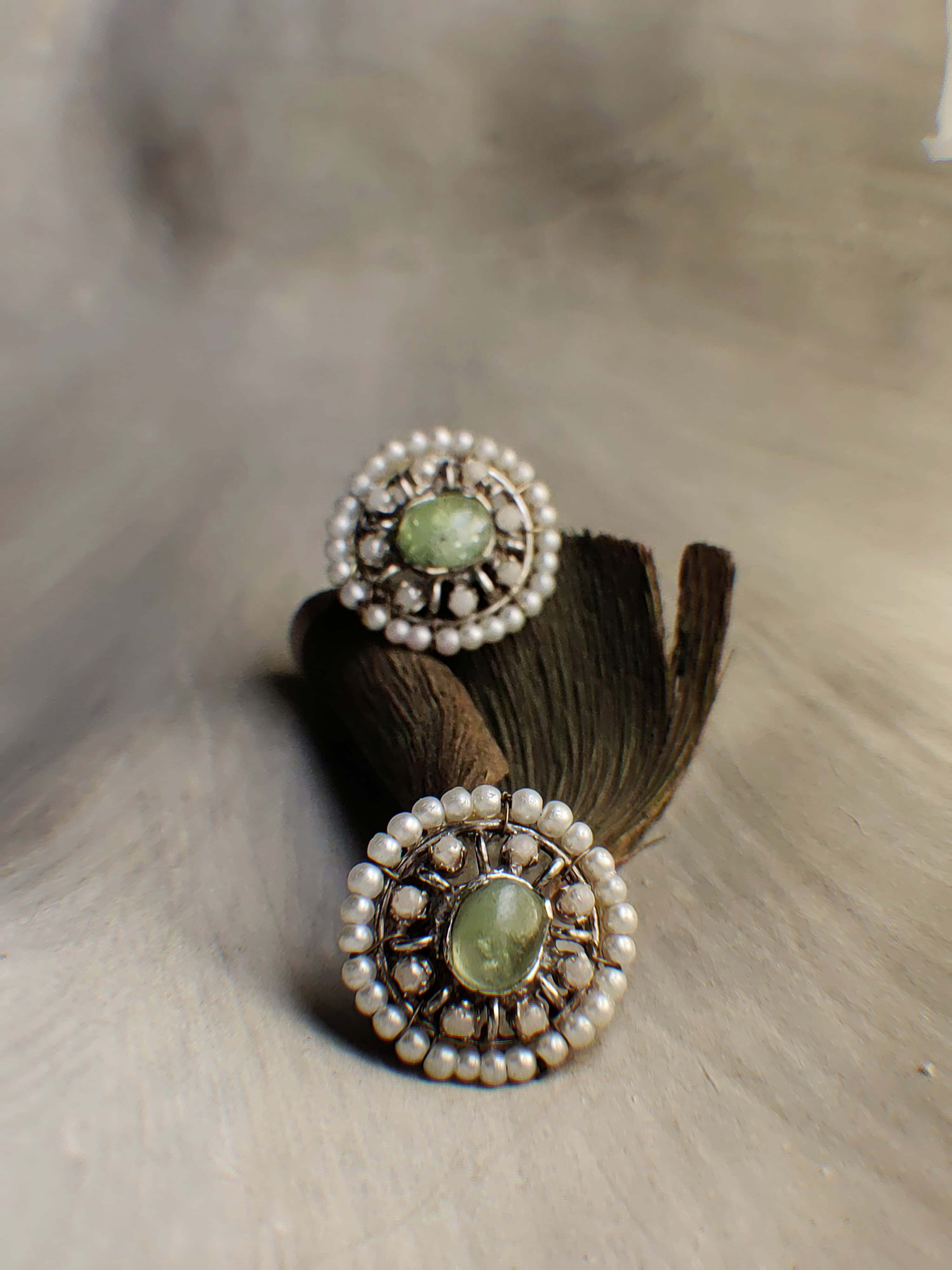 Fern: A handcrafted Earrings featuring Pearl Peridot and hues of White Green.