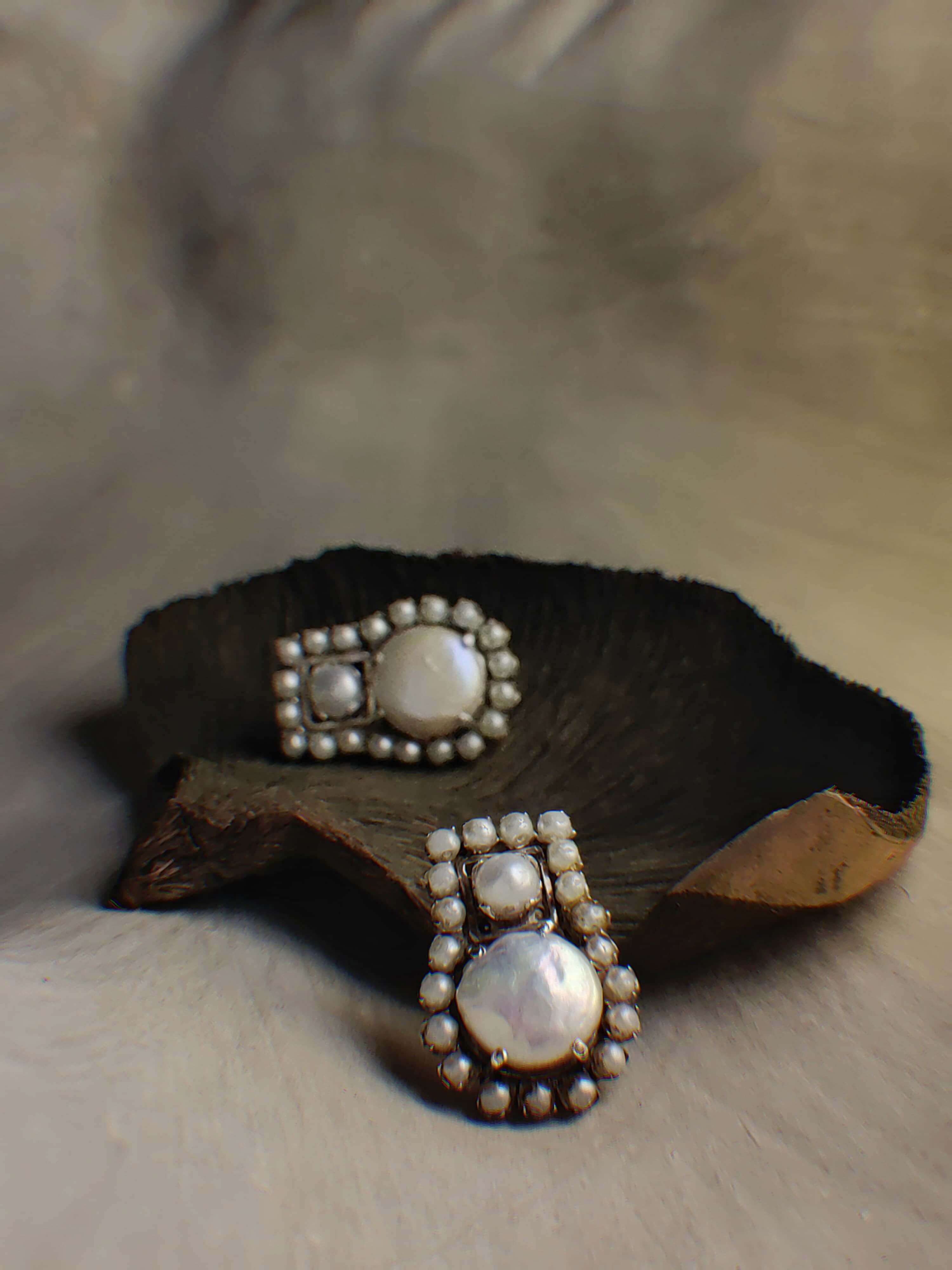 Snow: A handcrafted Earrings featuring Pearl and hues of White.