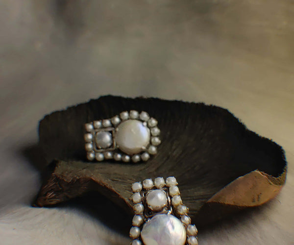 Snow: A handcrafted Earrings featuring Pearl and hues of White.