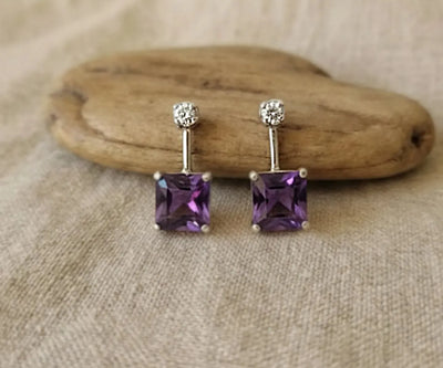 Silver Yasira jewelry showing off Amethyst and Zirconia in white and purple.