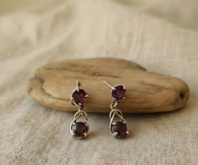 Handcrafted Aria II earrings boasting Garnet in red.