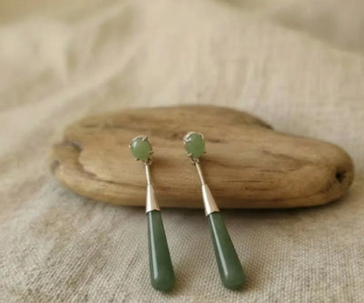 Elegant Jade II silver pieces containing Jade in green.