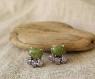 Beautiful Roma studs set with Peridot and Amethyst in green and purple.