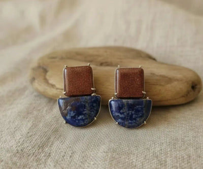 Elegant Zaw silver pieces containing Sandstone and Lapis Lazuli in blue and brown.