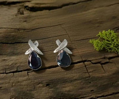 Sterling silver Cosmic earrings featuring Sapphire in blue.