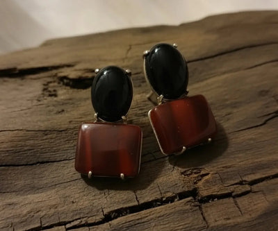Handcrafted Goji earrings boasting Onyx and Agate in black and red.