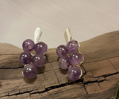Vara drop earrings highlighting Amethyst in purple.