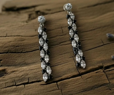 Contemporary Irene earrings with Zirconia in black and white.