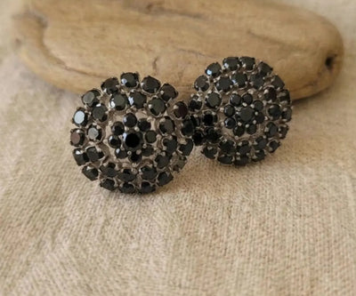 Silver Siro jewelry showing off Zirconia in black.