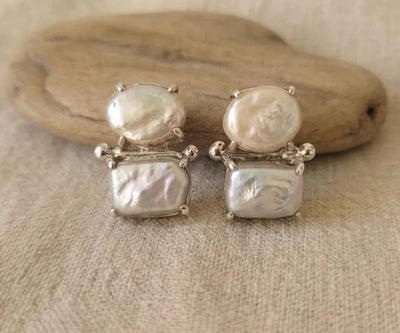 Handcrafted Sen earrings boasting Pearl in white.