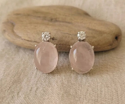Handcrafted Zaria earrings boasting Rose Quartz and Zirconia in pink.