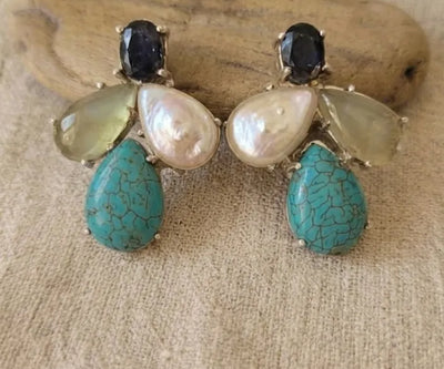 Tara drop earrings highlighting Sapphire, Aquamarine, Pearl, and Turquoise in green, white, and blue.
