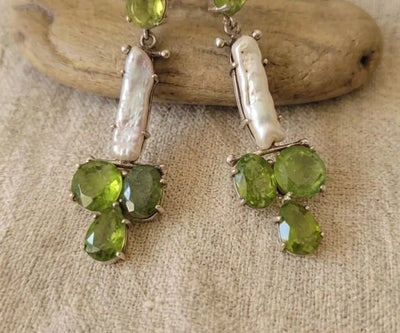 Refined Midori earrings detailed with Peridot and Pearl in green and white.